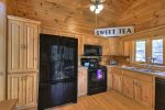Kitchen with Black electric Appliances 